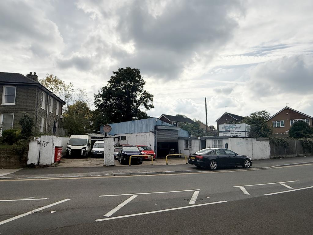 Lot: 102 - COMMERCIAL INVESTMENT PLUS VACANT LAND - Commercial Buildings Let at ?9,500 per annum